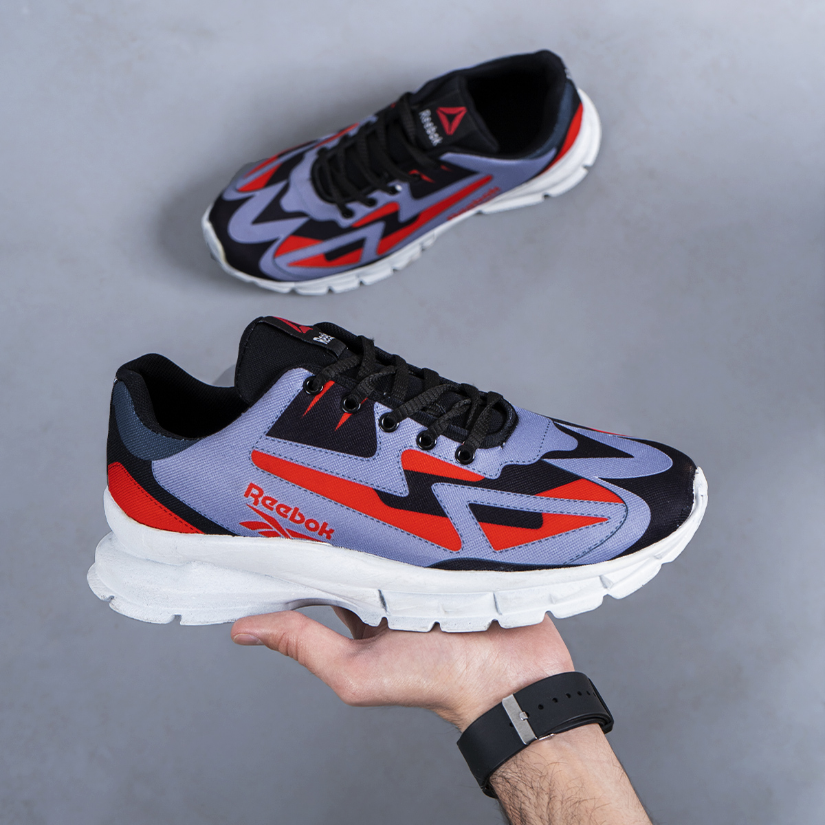 کفش ورزشی ریبوک طوسی قرمز مردانه مدل Ervan