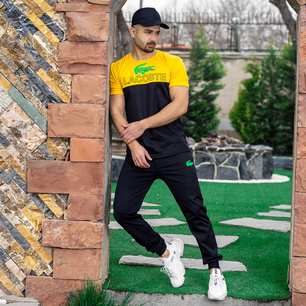 ست تیشرت شلوار مردانه زرد مشکی مدل Lacoste