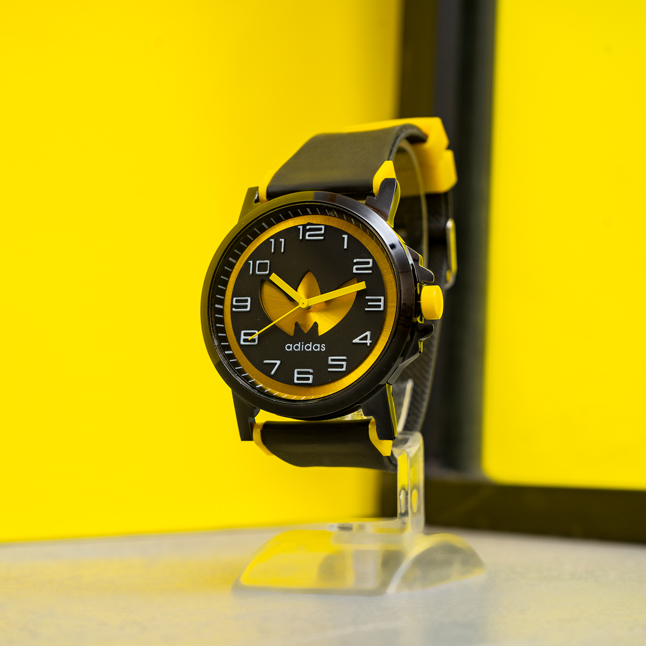 ساعت مچی آدیداس مشکی زرد مدل E51