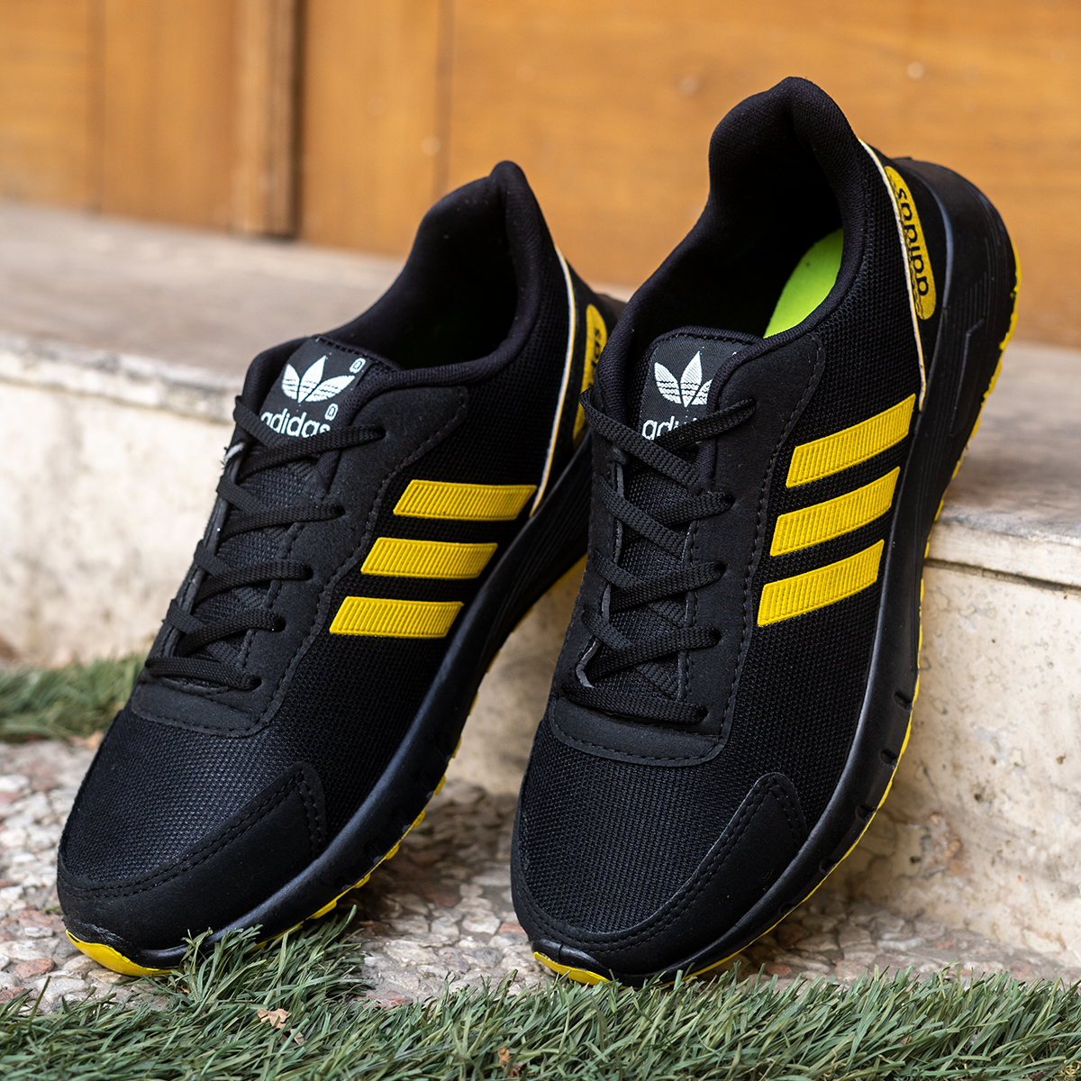 کفش ورزشی Adidas مردانه مشکی زرد مدل Matikan