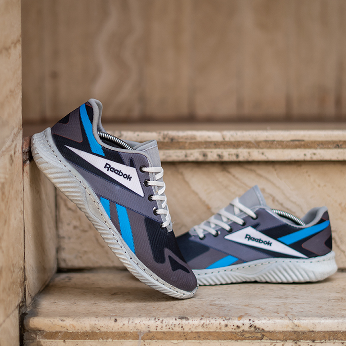 کفش ورزشی(T) ریبوک مشکی آبی مردانه مدل adena