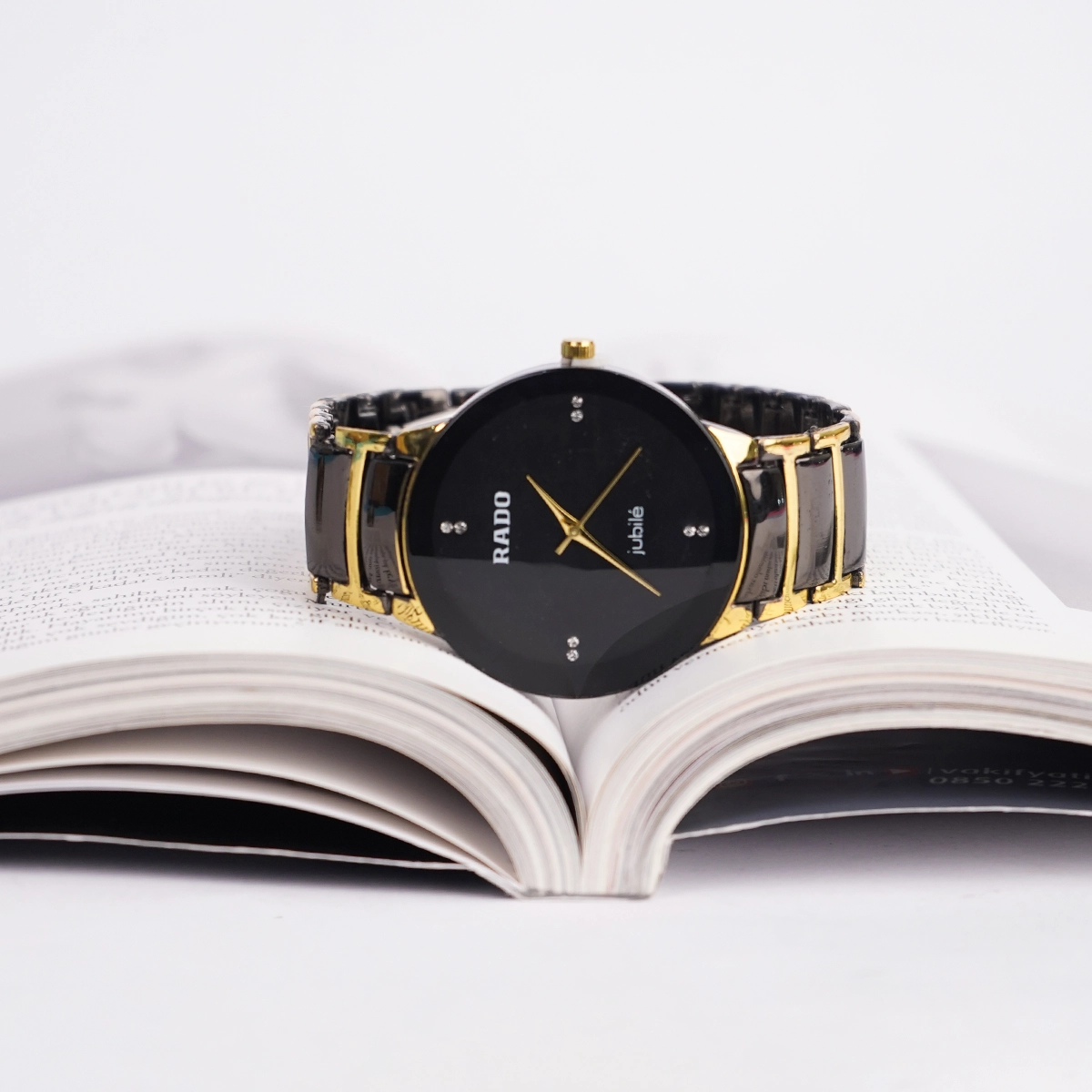 ساعت مشکی طلایی مردانه مدل Rado
