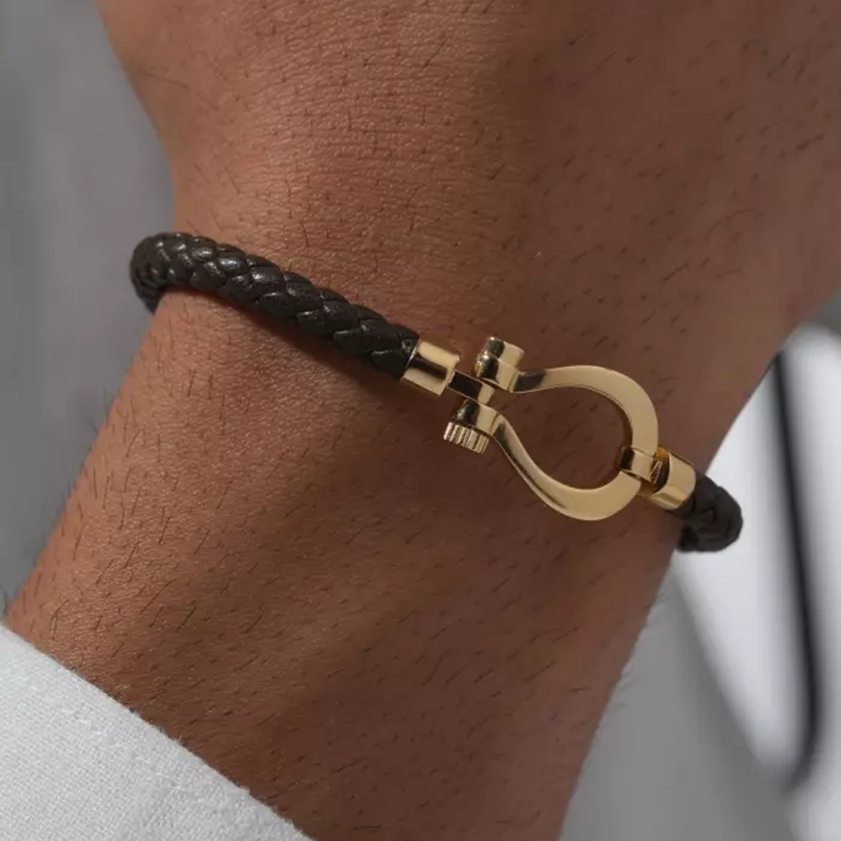 دستبند اسپرت امگا مشکی طلایی