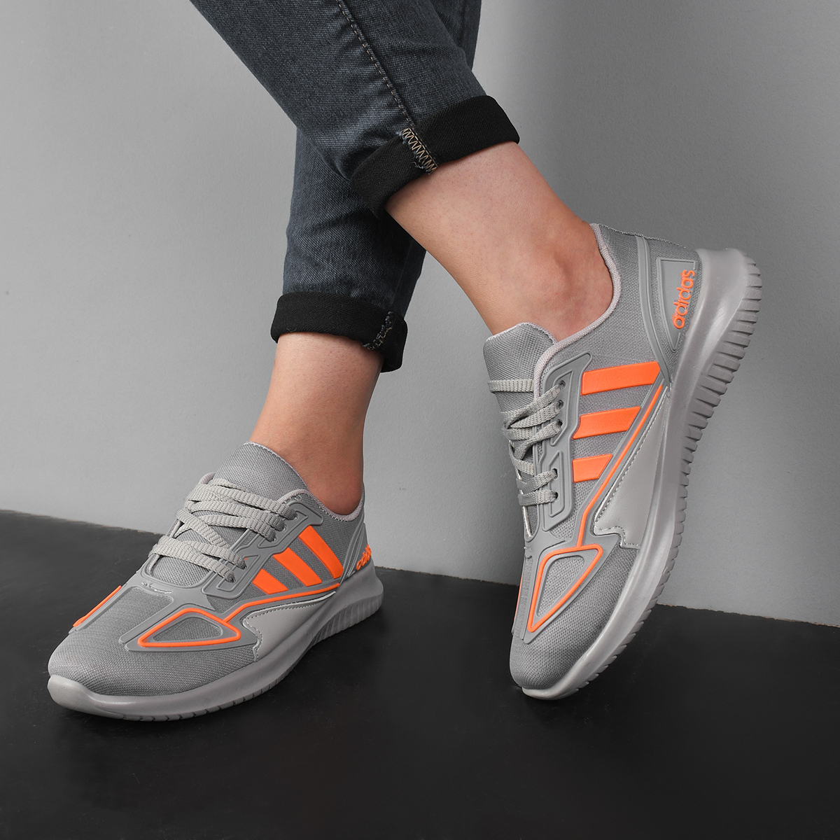 کفش ورزشی Adidas دخترانه طوسی نارنجی مدل Kiana