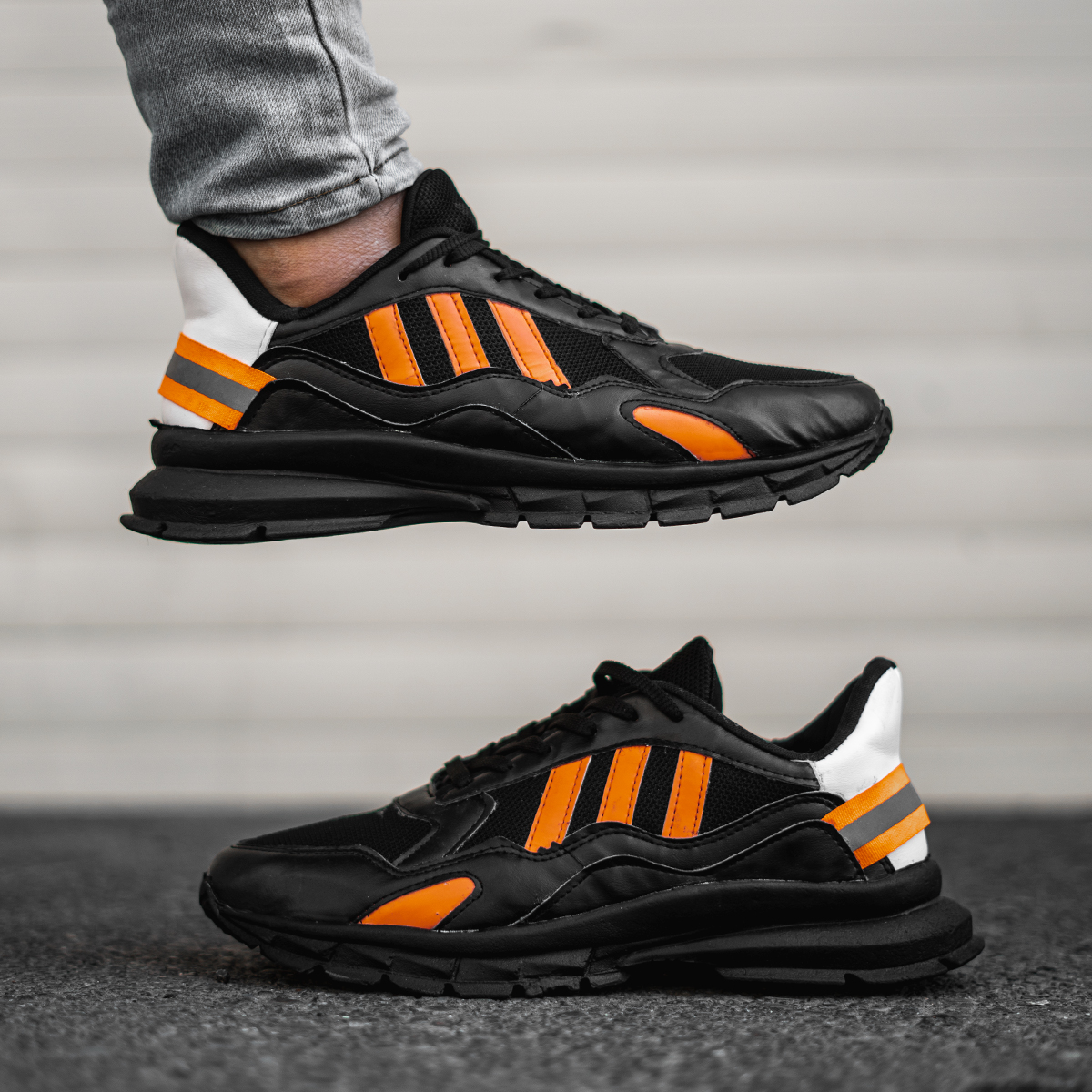 کفش ورزشی Adidas مردانه مشکی نارنجی مدل Levin